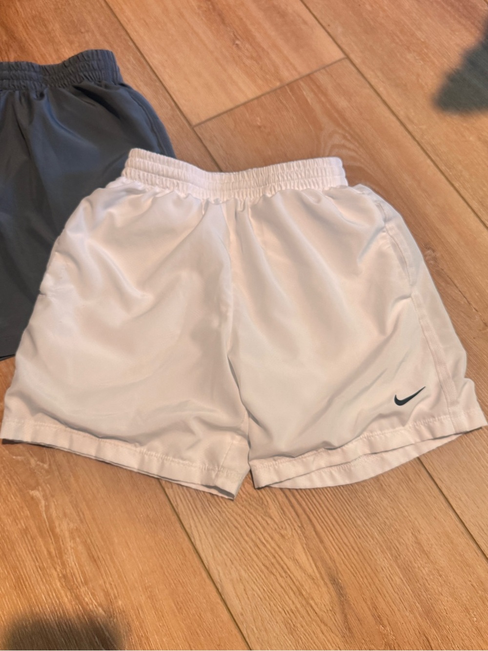 Nike White Kids' Athletic Shorts with Black Swoosh